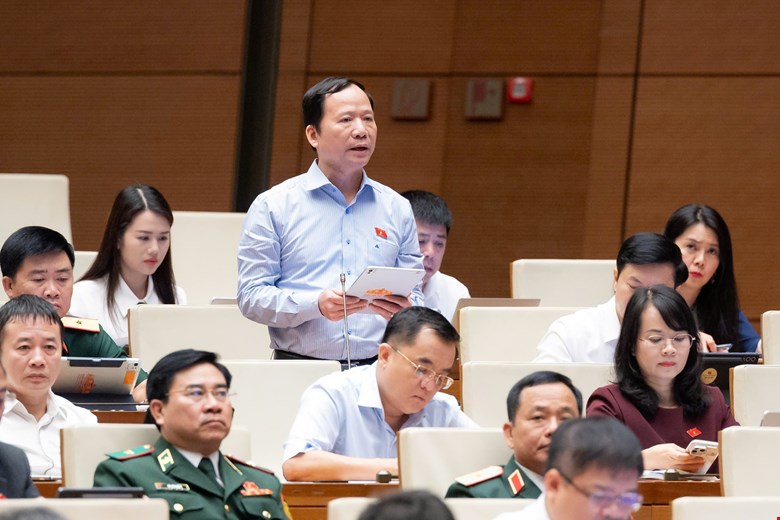 Sớm sắp xếp thôn, tổ dân phố, ban hành chế độ cho lực lượng không chuyên trách- Ảnh 1.